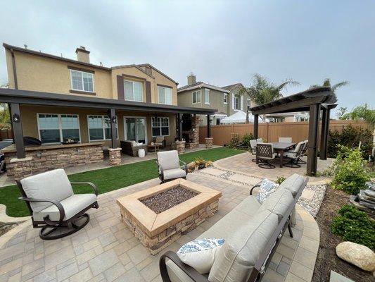 Full Backyard remodel including BBQ Island, Fire pit, Paver patios, trellis, patio cover, artificial turf, tv stand, fireplace and bench