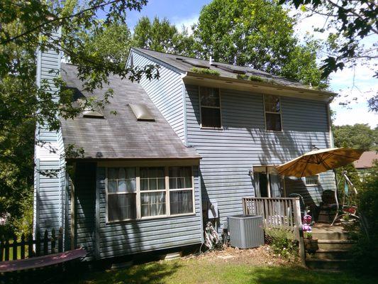 Before the roof replacement at Mr. B.'s house, he experienced hail damage.