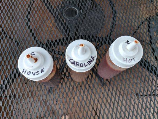 Left to right: House, Carolina, and hot BBQ sauces.