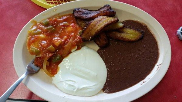 The $6.95 breakfast includes eggs, plantains, beans, cream and tortillas.