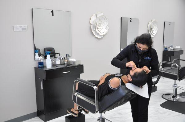 Prime iBrow Threading and waxing salon artist Monica at work