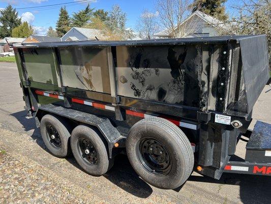 Dump trailer I bought at the end of 2021.  Came back to have them add side extensions.