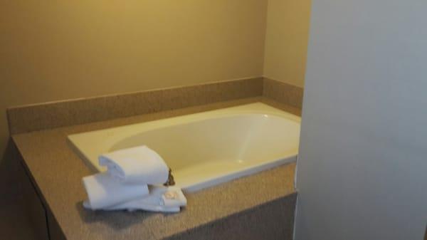 :-)   go for the suite. Clean quite cozy relaxing. Great visit