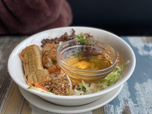 Vermicelli with pork, shrimp, and egg rolls.  Fish sauce included!