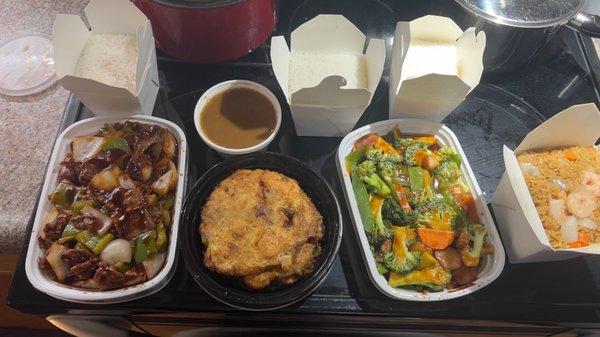 Vegetable delight, pepper steak and onions, shrimp egg foo young with gravy, and shrimp fried rice