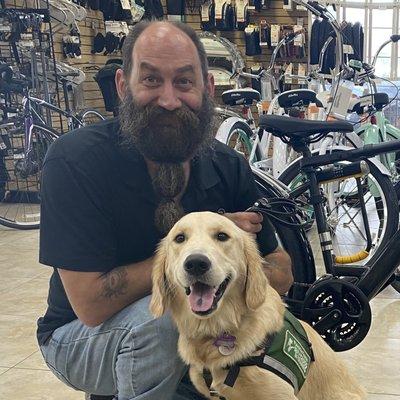 "Beard" and service dog in training "Frannie" helped pick out the perfect bike.