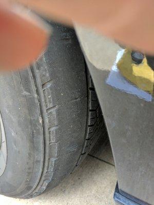 this is a picture of the tire on the rental minivan i was given bald and dry rot very dangerous would never pass inspection