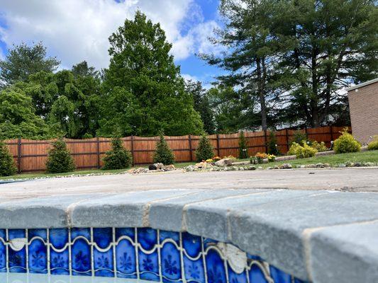 Now the cracked and broken tiles have gone 3/4 around the entire pool