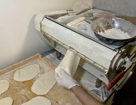 Pita dough - rolling it out - fresh and hot