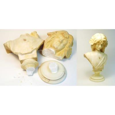 This alabaster bust was reassembled and missing chips were filled and colored to match the translucency of the stone.