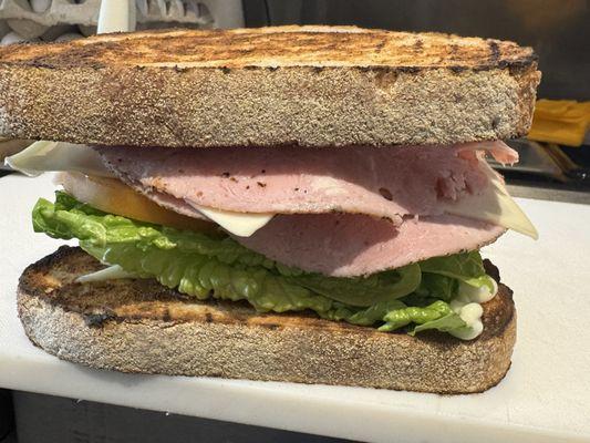 Pepper ham and Swiss cheese sandwich