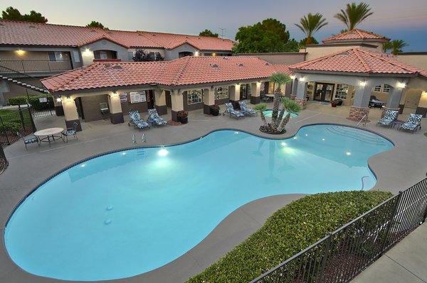 New pool furniture and evening shot of the resort style pool