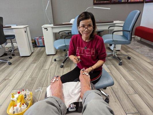 Donna painting nails.