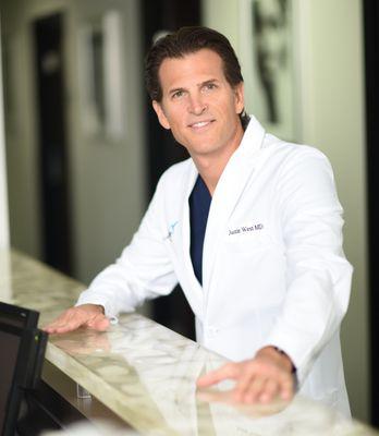 Dr. Justin West