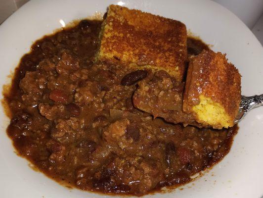 Homemade from scratch slow-simmered well-seasoned chili Daily LUNCH SPECIAL of the Day with corn bread