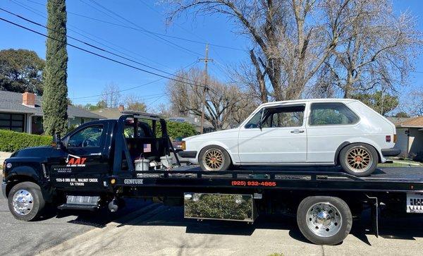 A.A.T. Silverado 6500HD towing a 1981 VW Rabbit