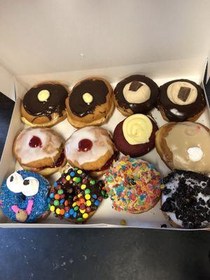 $16.99 mix and match dozen donuts.  Price Before tax and tip.  And you've gotta get a Cookie Monster!