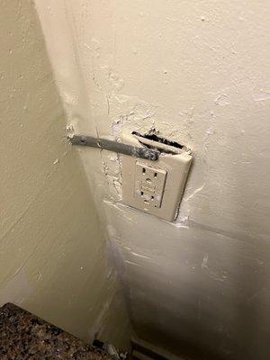 Electrical outlet bathroom area, electrical hazard for Real. C'mon Man