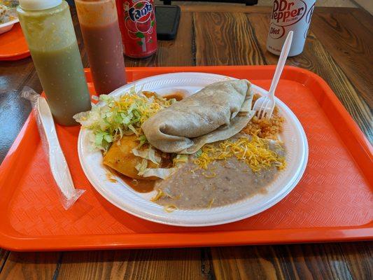 Chicken enchilada with rice and beans and a mini bean burrito.