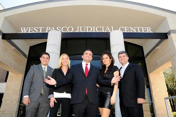 The Malki Law team in front of the courthouse