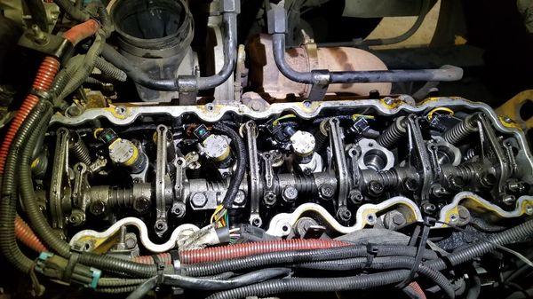 CAT C7 INJECTOR REMOVAL AND REPLACE. HIGH PRESSURE FUEL PUMP INTERNAL DAMAGE, SENT METAL THROUGH ALL 6 INJECTORS.