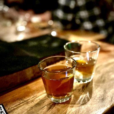 On the left a Noble Experiment on the right Tobacco Old Fashioned