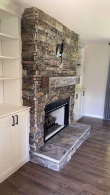 New wood burning fireplace with Non- combustible mantel and stone work