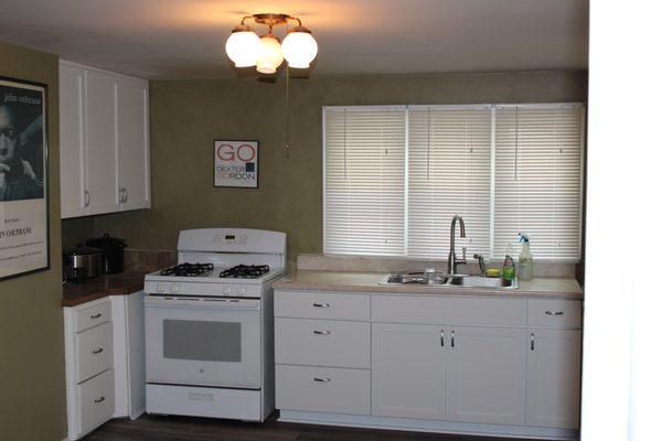 Flood new sink  base cabinet, we refaced all the other doors and draws to match new sink base cabinet