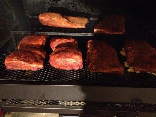 pork should and briskets cooking for a wedding gig