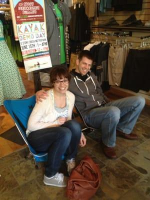 My daughter & boyfriend sitting in camping chairs !