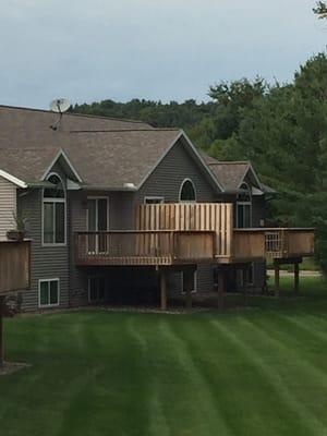 All the properties to my understanding were all identical and uniformed. The end unit is the only unit with extra ridge shingles