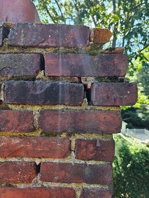 Old loose bricks on chimney