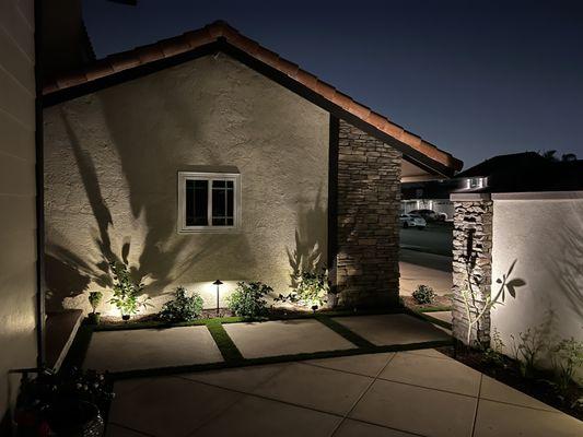 New chemical finish concrete for the new courtyard with fountain and outdoor lighting.