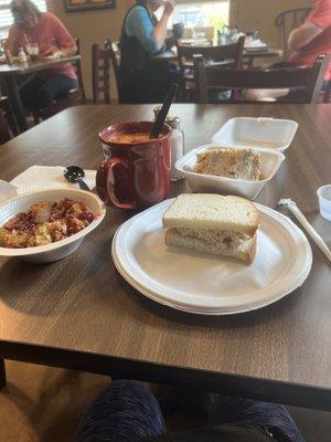 Chicken salad sandwich, cup of tomato basil soup, cherry cobbler and coconut cake.