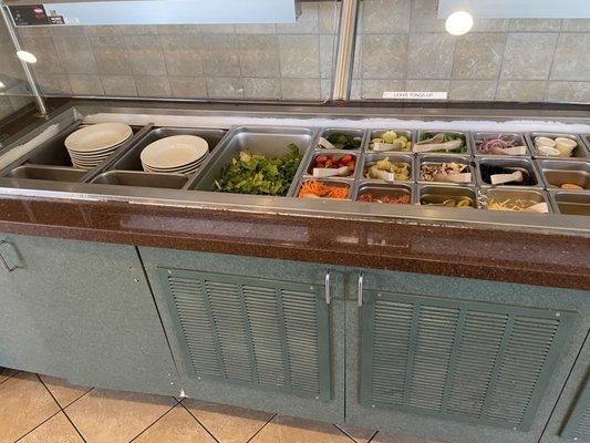 Nice salad bar set up . Missing a few items but it's good see . Go for it !!