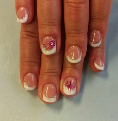 $16 for gel nails with decorated gel nail polish, hand massage, & parafin dip.