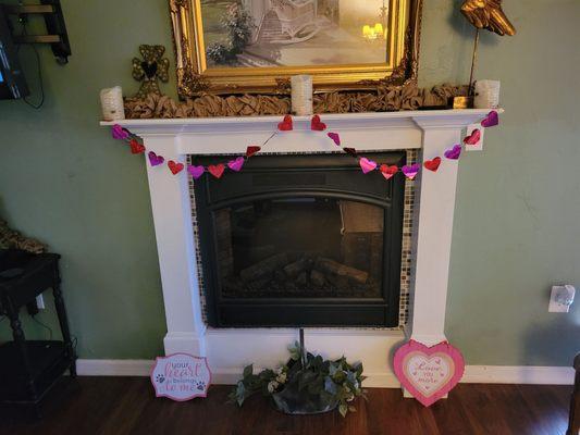 Loved the little hearts hanging on the fireplace