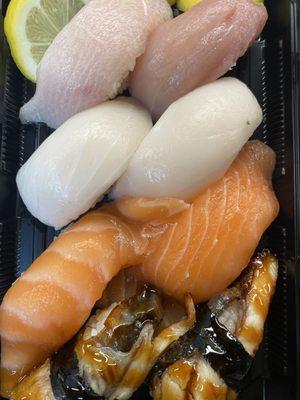 Nigiri Sushi... Salmon, White Tuna, Yellowtail, and broiled fresh water Eel (unagi).  BIG thick cuts of fish.  SO FRESH!!