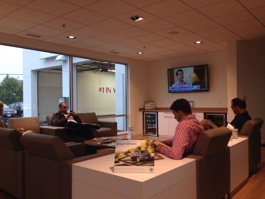 Service waiting area. Complimentary coffee, fruit and granola bars.