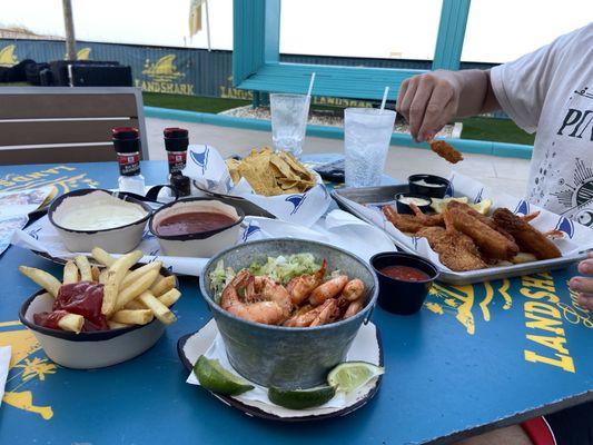 Chips cheese and salsa. Seafood Combo. Steamed shrimp app. Side fries.