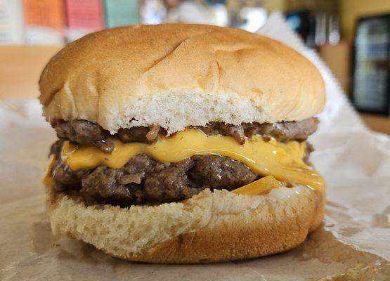 Juicy and flavorful double cheeseburger, loaded with meat. Priced at $6.81 as of September 2024.