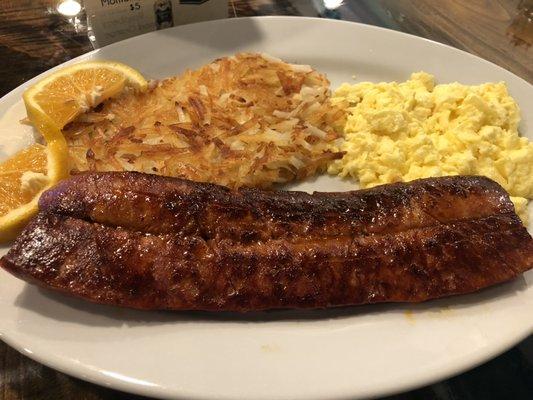 Linguica (Portuguese Sausage) and scrambled eggs with hash browns.