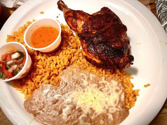 Chargrilled 1/2 chicken with rice and refried beans