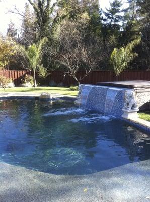 Pool with waterfall like feature.