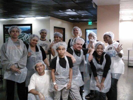 Our volunteers serving lunch to the homeless at the Midnight Mission.