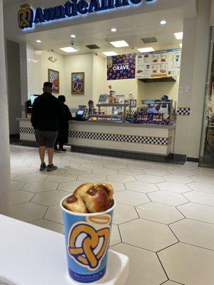 Mini Pretzel Dogs and the front of shop