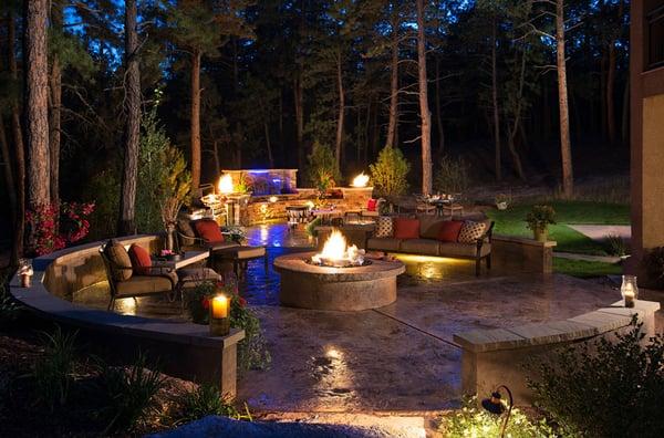 Patio, fire pit, outdoor kitchen, exterior lighting.