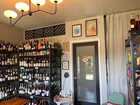 Matt built this wall separating our living space from our wine shop. He also installed a portable AC unit in the storage area.