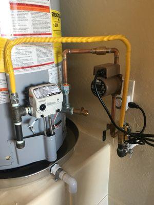 New water heater with recirculating pump