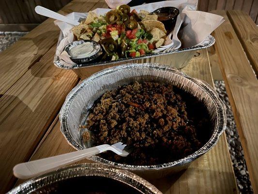 $16 half nachos in a huge container. You can't order anything smaller for yourself. You have to buy large portions.